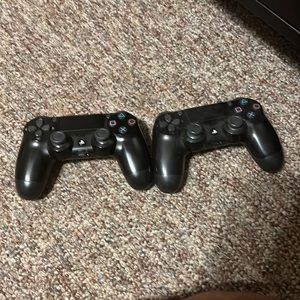 Two PlayStation controllers
